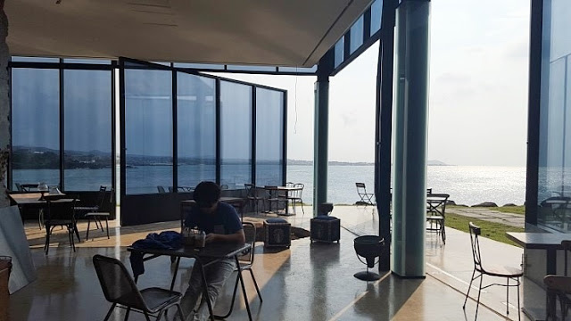 korea korean kpop idol boy band group big bang gdragon's cafe the monstant cafe jeju island korea destinations exterior ocean view kpopstuff